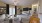 a living room with a tv and furniture