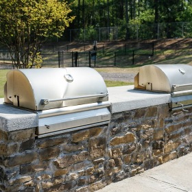 Grilling station and lush landscaping