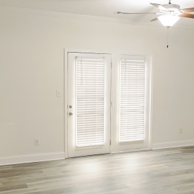 Open space living area with natural lighting