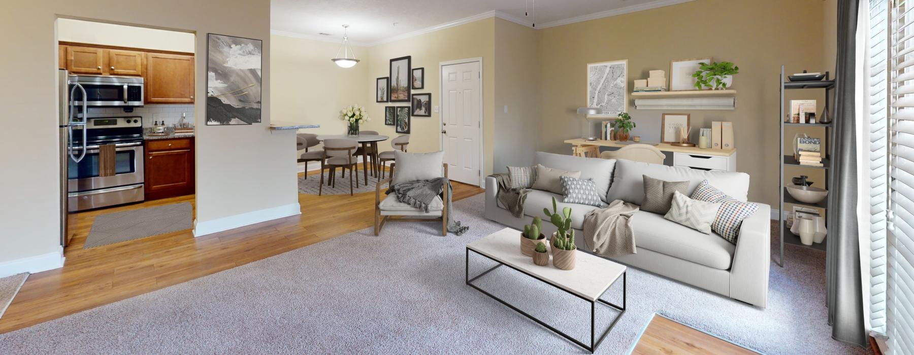 a living room with a couch and a table